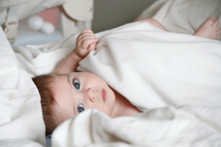 fussy baby calms down when swaddled