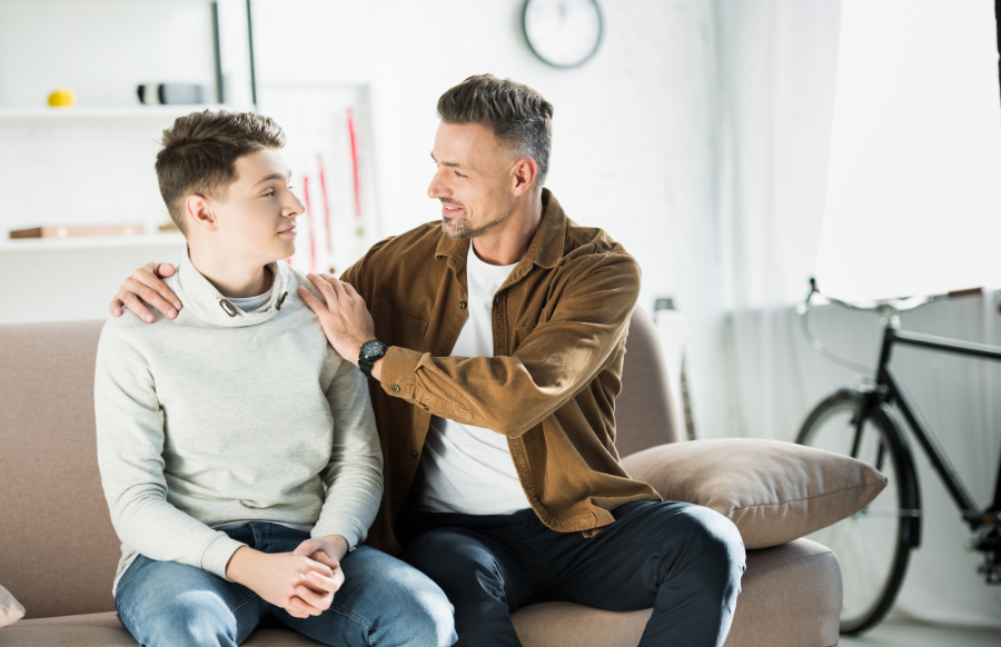Father giving advice to his teenage kid
