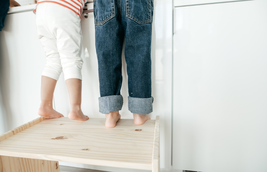 kids are barefoot stepping on an elevated platform