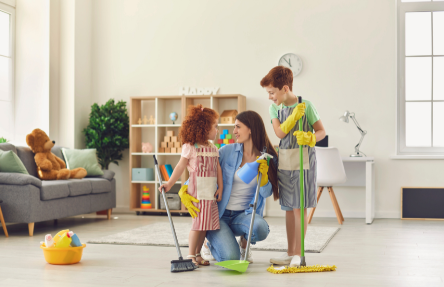 mother and children cleaning the house
